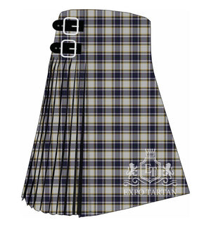 Men's Boucherville Dress Tartan Kilt showing traditional knife pleats in a crisp white sett, intricately intersected by navy blue and grey bands with fine yellow lines