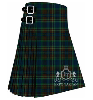 Men's Emerald Coast Tribute Tartan Kilt showing traditional knife pleats and black leather side straps in a deep forest green, dark navy blue, and rich espresso brown sett, intricately intersected by bright emerald green and fine royal blue overcheck