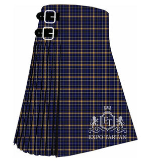Men's Chandolin Tartan Kilt showing traditional knife pleats and black leather side straps in a deep navy blue sett, intricately intersected by golden yellow bands and fine white overchecks