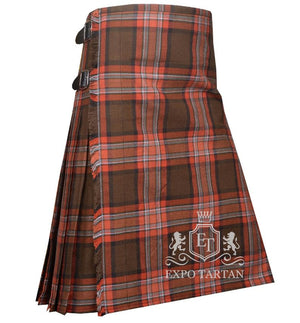 Men's County Down Tartan Kilt showing traditional knife pleats and black leather side straps in an earthy brown and orange sett, intricately intersected by dark bands with light blue and white overcheck