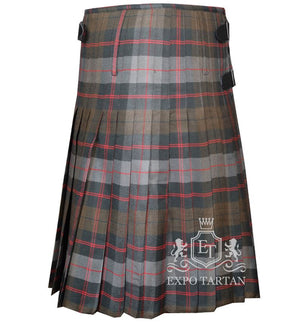 Men's Guthrie Weathered Tartan Kilt showing traditional knife pleats and black leather side straps in a rustic slate grey and brown sett, intricately intersected by dark charcoal bands and striking red overchecks