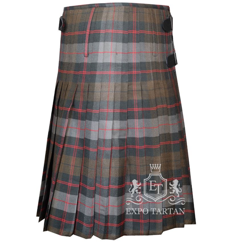 Men's Guthrie Weathered Tartan Kilt showing traditional knife pleats and black leather side straps in a rustic slate grey and brown sett, intricately intersected by dark charcoal bands and striking red overchecks