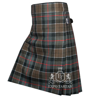 Men's Leslie Green Weathered Tartan Kilt showing traditional knife pleats and black leather side straps in a muted brown and grey-green sett, intricately intersected by dark bands and bright red and white overchecks