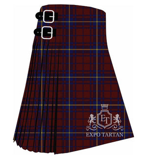 Men's Rajput Tartan Kilt showing traditional knife pleats in a deep burgundy and navy blue sett, intersected by a fine golden-yellow overcheck