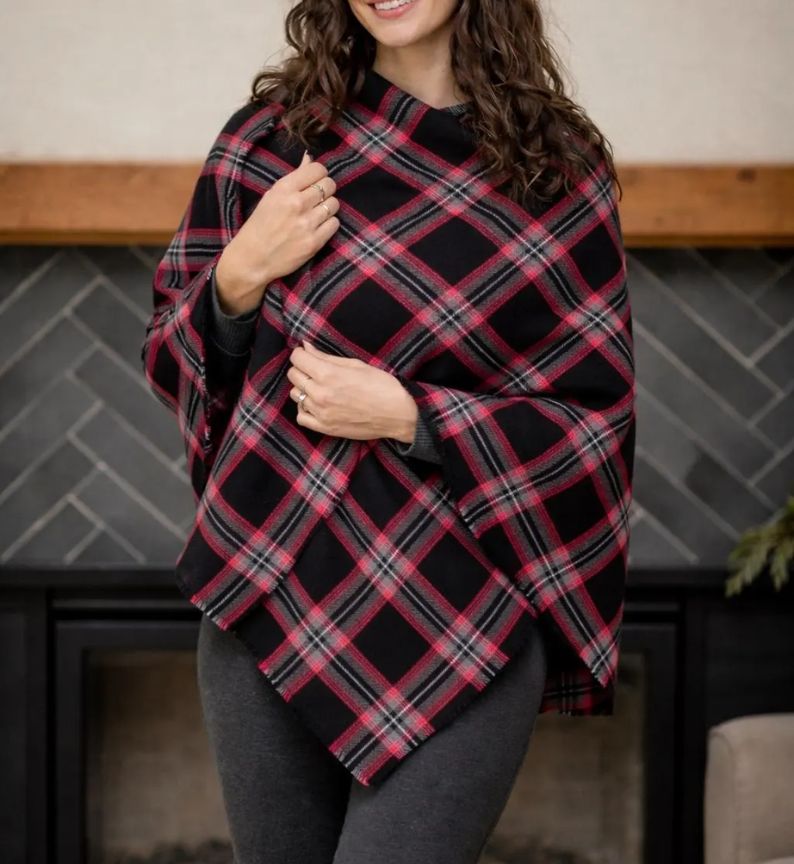 A Women wearing a Witches of Scotland Tartan Shawl